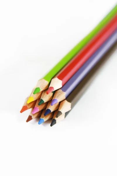 Colorful wooden pencils for drawing on white background — Stock Photo, Image