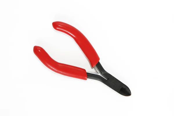 Alte rostige Zangen Werkzeuge, Metallschneidezangen mit rotem Griff — Stockfoto