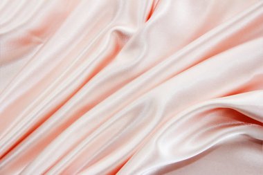 Dekoratif pileli pembe saten kumaş dokusu