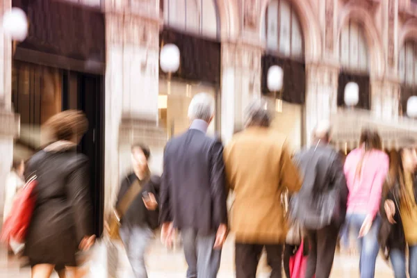 Urban move, people walking in city, motion blur, zoom effect