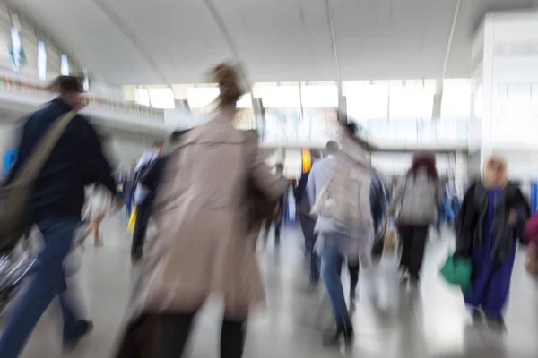 Blurred airport, traveler silhouettes in motion blur — Stock Photo, Image