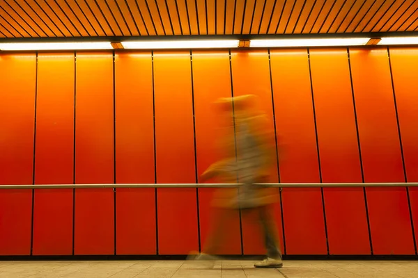 Orange abstract of woman in tunnel — Stock Photo, Image