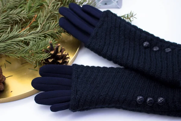 Blue gloves and Christmas decoration