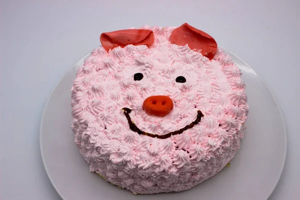 Pink cake in the form pig's face