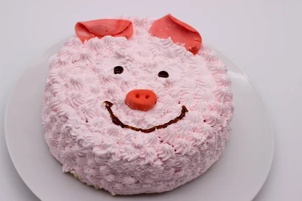 Pink cake in the form pig\'s face