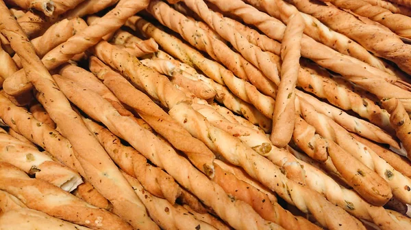 Fondo de palitos de pan o grissini con semillas . — Foto de Stock