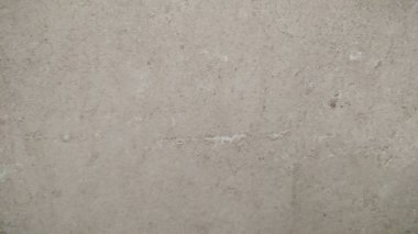 Eski gri duvarın soyut arka planı. Seçici odaklama.