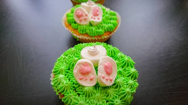 Easter Cakes. Symbolize The Easter Bunny, Which Is Hidden In The Grass, And Outside Protrude Paws And Tail.