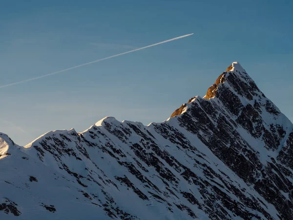Airplane Train Dramatic Tuxer Joch Peak Austrian Alps Royalty Free Stock Images