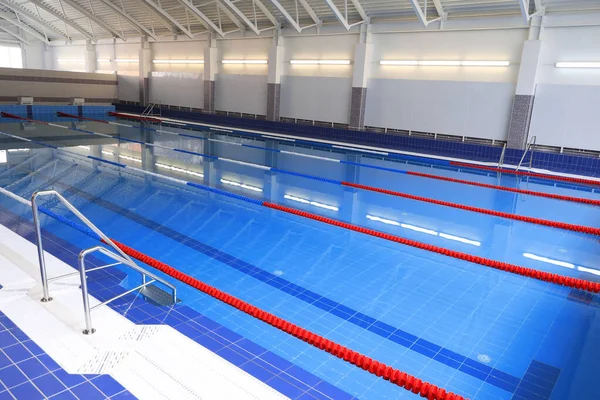 Empty indoor pool with clean water