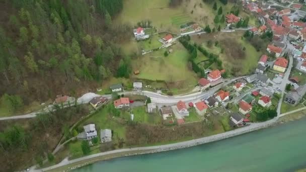 Aerial Flying River Small Settlement Lots Green Surfaces Houses — Stock Video