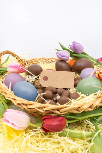 Painted Eggs Easter Tulips Arrival Spring Wicker Basket Text Label — Stock Photo, Image