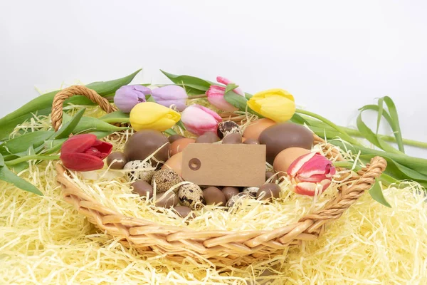 Easter Themes Arrival Spring Basket Filled Eggs Surrounded Tulips — Stock Photo, Image