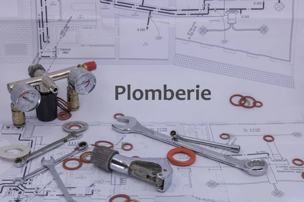 Plumbing and plumber Graphic resource with house plan safety equipment and plumbing equipment (plomberie is Plumbing written in French)