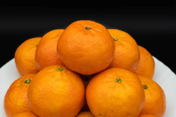 Mandarin is the fruit of the different citrus species commonly called mandarins, among them Citrus reticulata, Citrus unshiu, Citrus reshni, as well as their hybrids, including Citrus  tangerina, whose taxonomy is discussed.It belongs to the grou