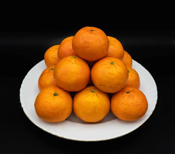 Mandarin is the fruit of the different citrus species commonly called mandarins, among them Citrus reticulata, Citrus unshiu, Citrus reshni, as well as their hybrids, including Citrus  tangerina, whose taxonomy is discussed.It belongs to the grou