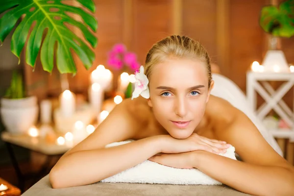 Young beautiful woman  with  blond hair at the spa salon - Image