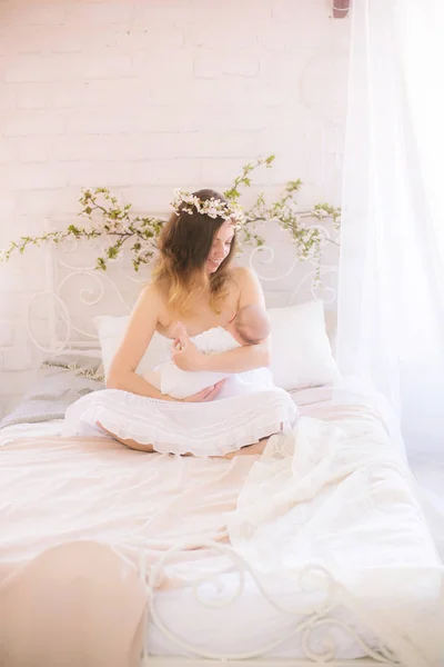 Young Cute Mom Wreath Cherry Blossoms White Dress Holding Baby — Stock Photo, Image