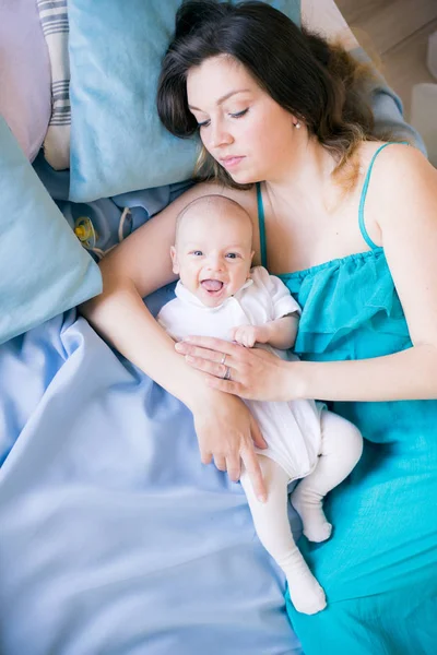 Young Mother Little Cute Baby Lying Bed Blue Blanket Home — Stock Photo, Image