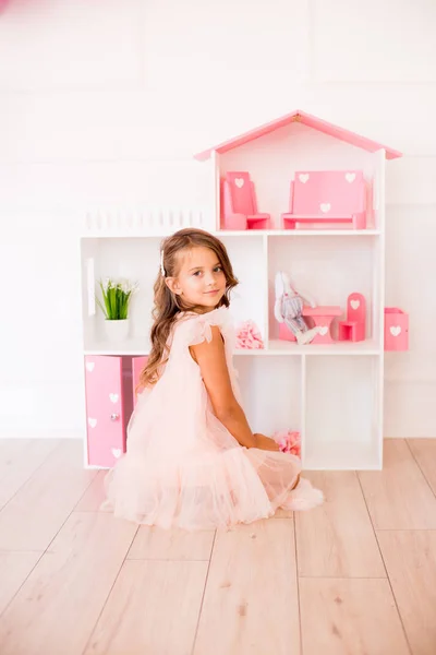 Cute Happy Girl Beautiful Dress Home Plays Dollhouse Toys — Stock Photo, Image