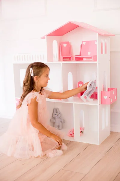 Cute Happy Girl Beautiful Dress Home Plays Dollhouse Toys — Stock Photo, Image