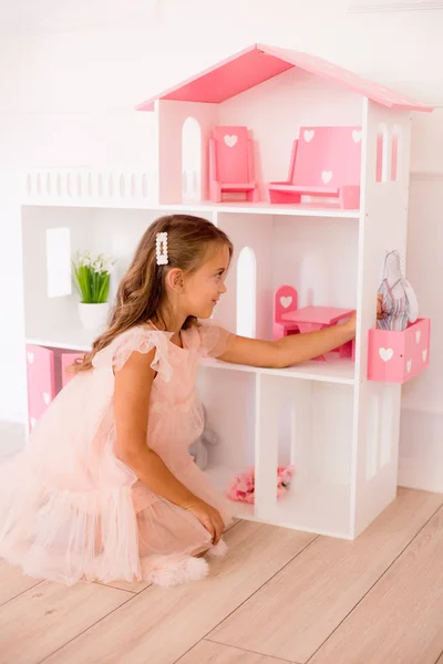 Cute Happy Girl Beautiful Dress Home Plays Dollhouse Toys — Stock Photo, Image