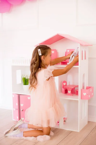 Cute Happy Girl Beautiful Dress Home Plays Dollhouse Toys — Stock Photo, Image