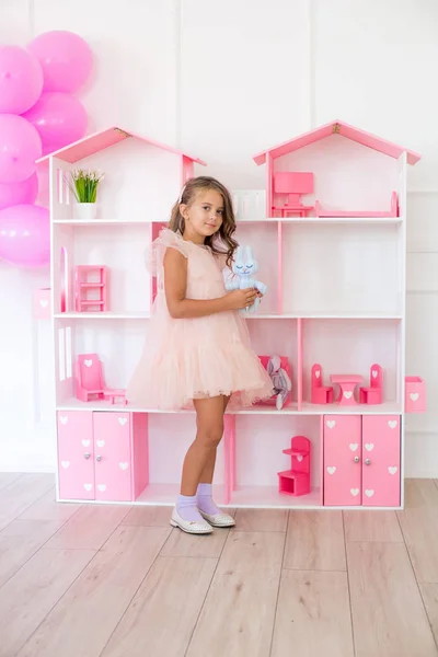 Cute Happy Girl Beautiful Dress Home Plays Dollhouse Toys — Stock Photo, Image