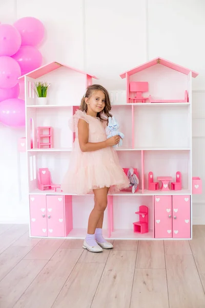 Cute Happy Girl Beautiful Dress Home Plays Dollhouse Toys — Stock Photo, Image