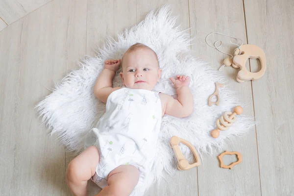 Lovely Cute Newborn Baby Lies White Rug Plays First Eco — Stock Photo, Image