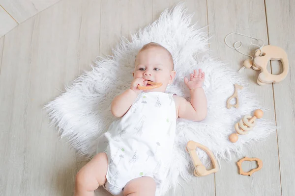 Lovely Cute Newborn Baby Lies White Rug Plays First Eco — Stock Photo, Image