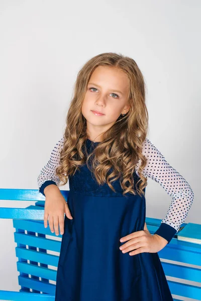Cute Girl Blond Curly Hair School Fashion Clothes Blue Chair — Stock Photo, Image
