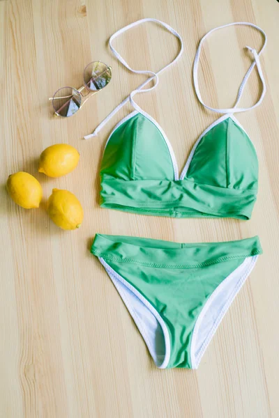 Bright Trendy Bikini Wooden Background Yellow Lemons Tropical Green Leaves — Stock Photo, Image