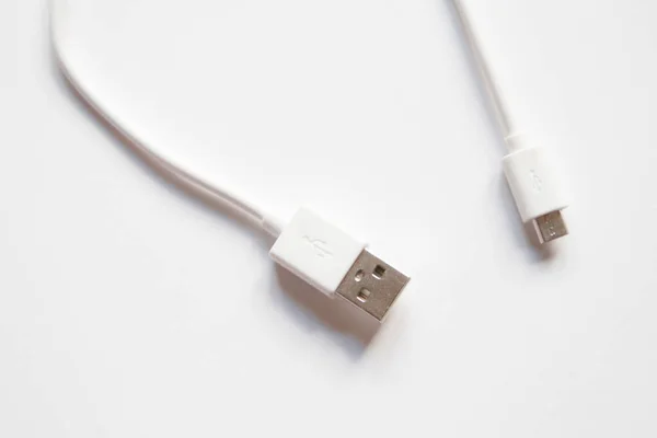 USB cable - mini USB on a white background