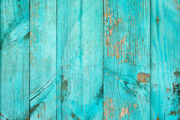 Weathered blue wooden background texture. Shabby wood teal or turquoise green painted. Vintage beach wood backdrop.
