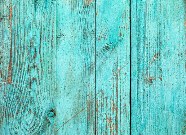 Weathered blue wooden background texture. Shabby wood teal or turquoise green painted. Vintage beach wood backdrop.