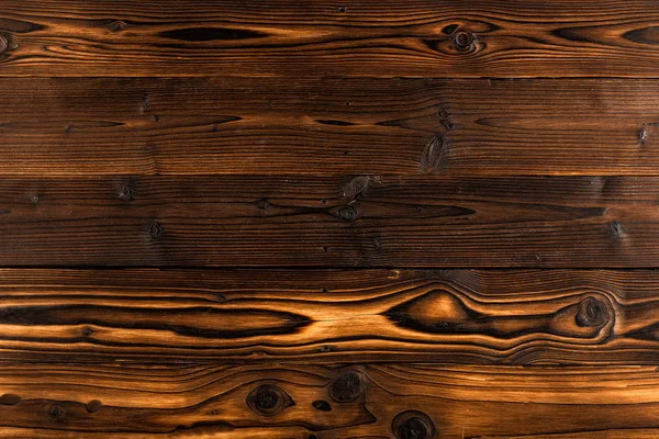 .Koyu kahverengi ahşap zemin ile yüksek kararlılık. Üstten görünüm.