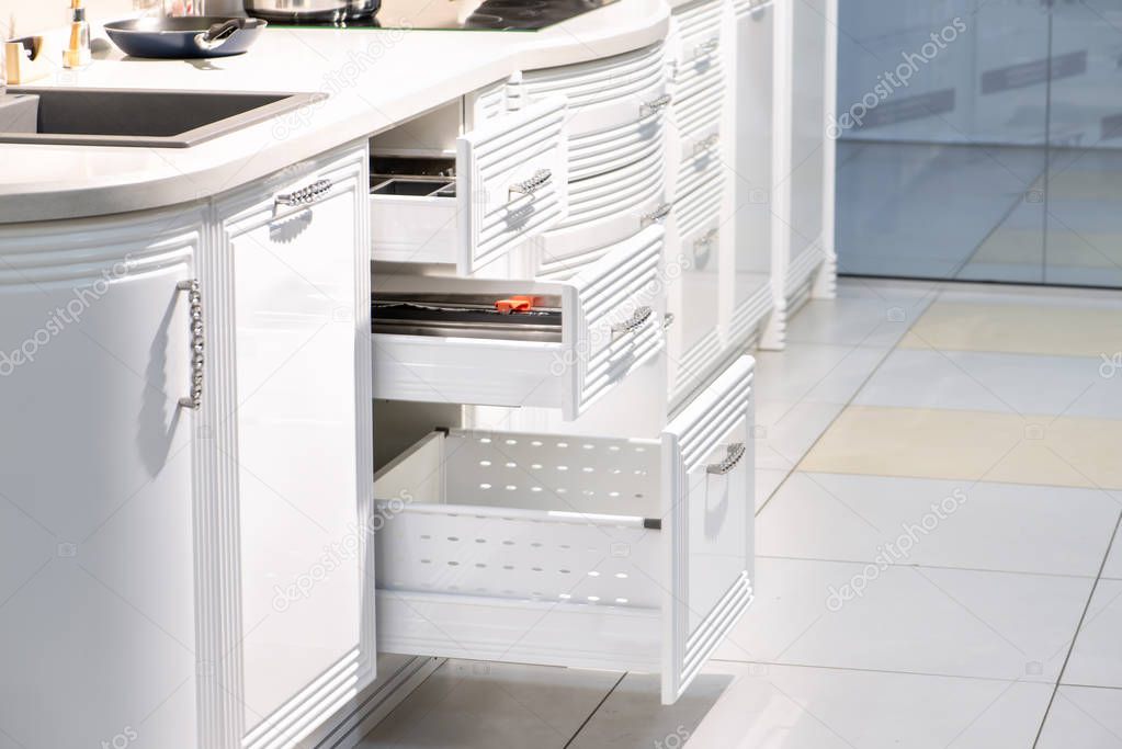 drawer with plates in a modern kitchen