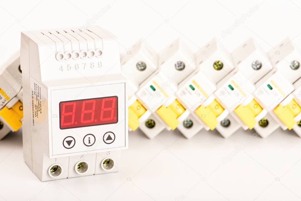 Automatic circuit breakers, on a white background. Electrical equipment. Accessories for electrical protection and control