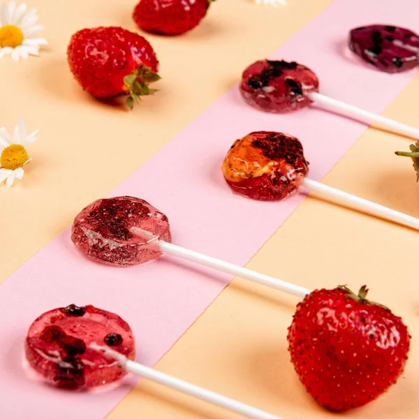 Lollipops made from natural fruits and berries. Healthy food and vegetarian food concepts.