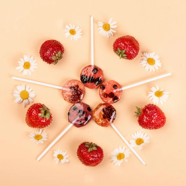 Lollipops made from natural fruits and berries. Healthy food and vegetarian food concepts.