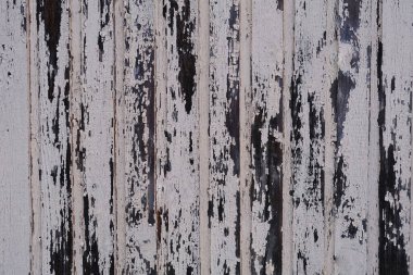 Eski püskü bir tahtanın arkaplanı.