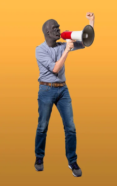 Homem Usando Máscara Gorila Usando Megafone Com Punho Levantado Recorte — Fotografia de Stock