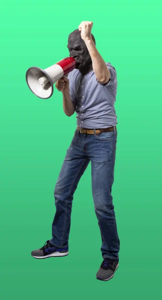 Man Gorilla Mask Yelling Megaphone Fist Raised Isolated Cutout Green — Stock Photo, Image