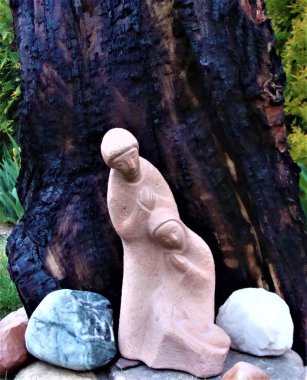 Kutsal Aile bahçesinde, Noel heykeli