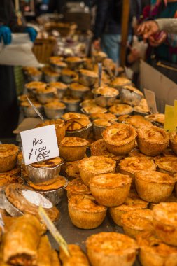 Savoury Pies for Sale at a Market Stall in England clipart