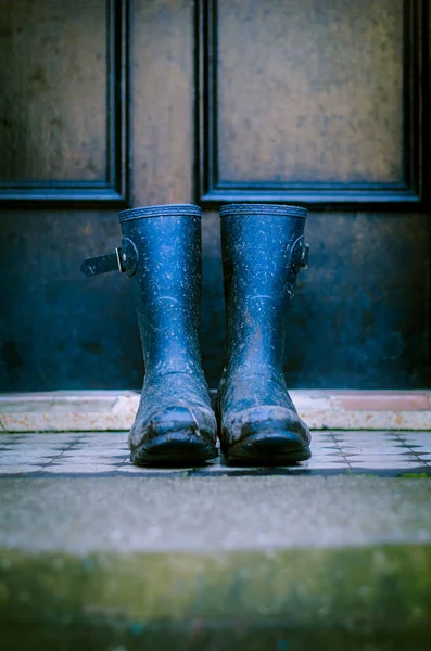 Close Muddy Wellington Boots Front Door House — Stock Photo, Image