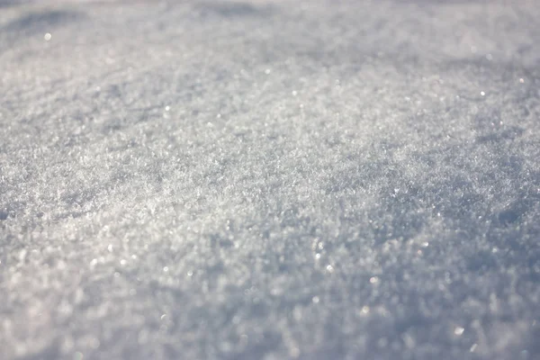 snow surface in bright sunshine light