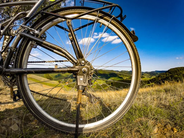 View of Beskids Mountains through bike wheel