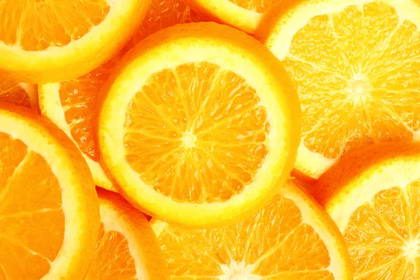 新鮮なオレンジ スライスの背景 — ストック写真